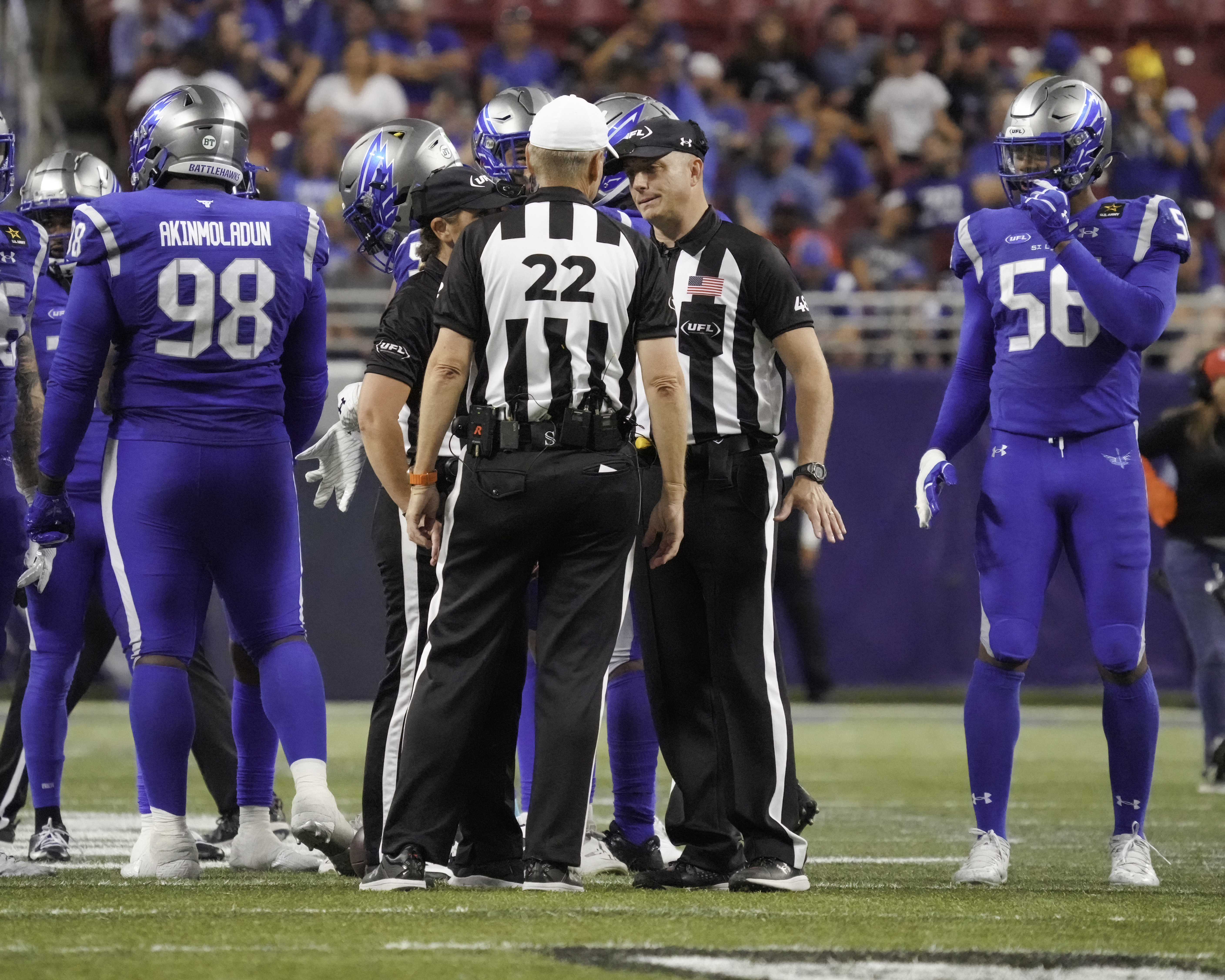 Michael Kennedy officiating a UFL professional football game